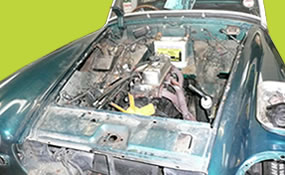 MG Midget being stripped down prior to restoration